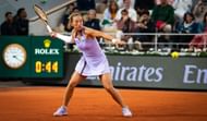 Zheng in action at the 2025 French Open - Day One - Source: Getty